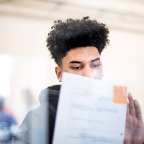 Student filling out a form